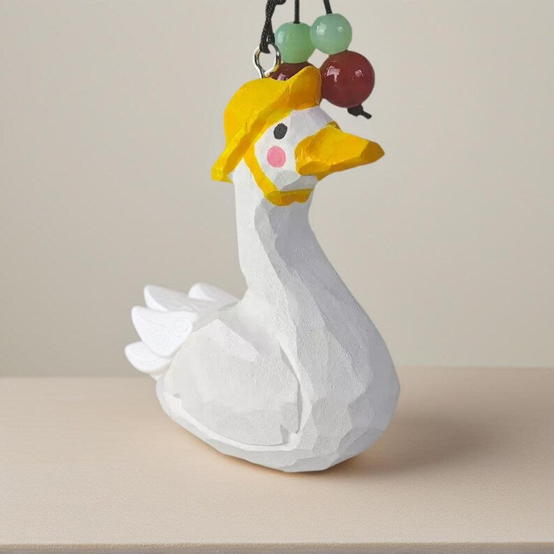 Handgeschnitzter hölzerner Enten-Taschenanhänger mit Kristallperlen